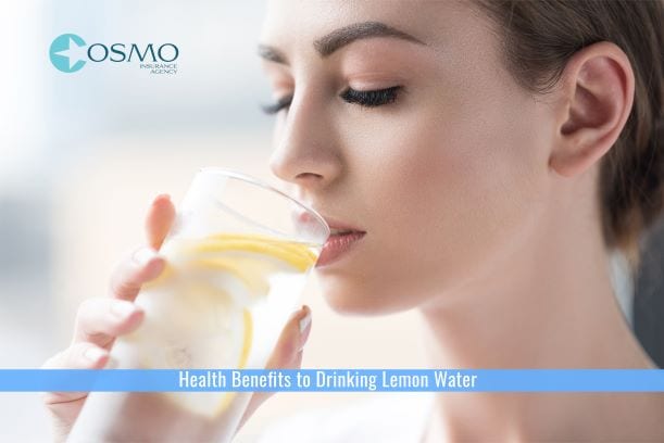 woman drinking lemon water