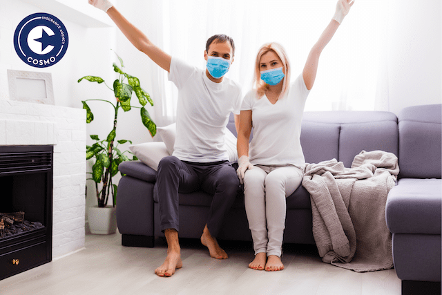 couple wearing masks at home