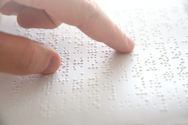 Hand,Of,A,Blind,Person,Reading,Some,Braille,Text,Touching